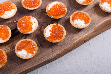 Tartalets with red caviar