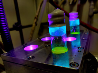 Green Organic photochemical rection in sealed glass vials under metal block cooling condition under...