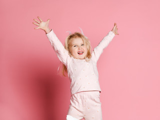 Happy kid pajama jumping