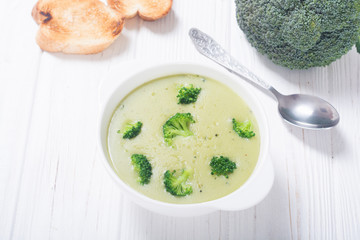 Fresh broccoli cream soup in bowl