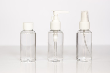 Beauty cosmetics glassbottle; branding mock up; front view on pastel white background. Package for essential oil.
