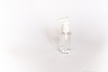 Beauty cosmetics glassbottle; branding mock up; front view on pastel white background. Package for essential oil.