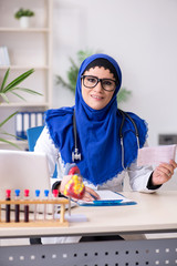 Female doctor in hijab working in the hospital