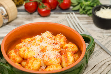 Gnocchi di patata with tomato sauce and parmesan. Gnocchi, Italian food