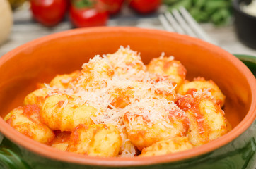 Gnocchi di patata with tomato sauce and parmesan. Gnocchi, Italian food