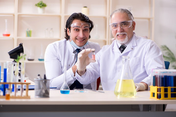 Two chemists working in the lab 