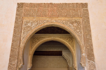Keyhole arabic arched doorway at the court of Myrtles Comares Palace Nasrid Alhambra Spain