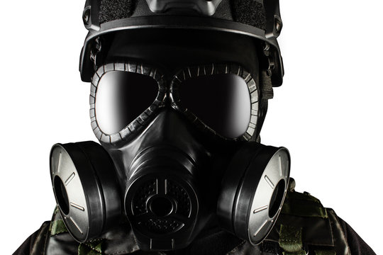 Isolated warrior soldier in gas mask front view closeup.