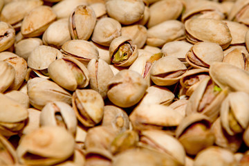 Pistachio texture. Nuts. Green fresh pistachios as texture