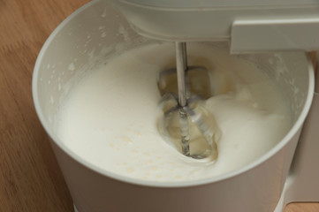 Mixing cake toppings with food processor. Close-up. Soft focus.