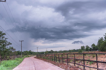 On a road there was a cloud of storms.