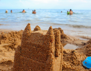 Fototapeta na wymiar Sand castle by the sea