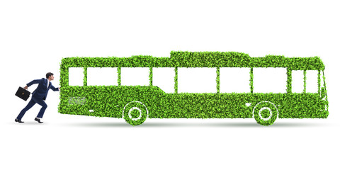 Businessman with green ecological vehicle