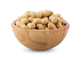 peanuts in wood bowl isolated on white background. full depth of field