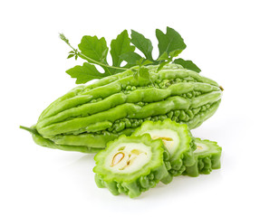 Bitter melon with leaf on white background. full depth of field