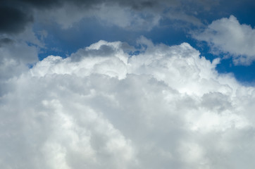 A huge white cloud against blue sky