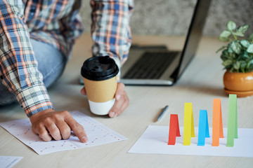 Businessman checking sales data