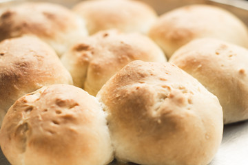 baked stuffed breads on a wooden board