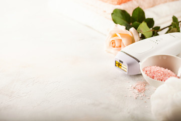 Modern photoepilator with bath accessories