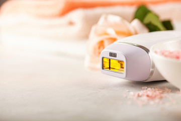 Modern photoepilator with bath accessories