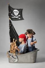 Boys play pirates on the ship