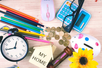 flat lay top view shot, scattered home office workspace or desk concept with accessories and stationery