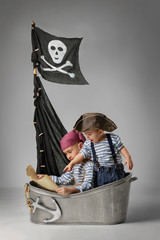 Boys play pirates on the ship