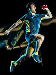 Fototapeta na wymiar one caucasian runner running jogger jogging man light painting speed effect isolated on black background