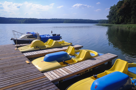 Paddle boats on the Lanskie Lake in Olsztyn Lake District, near the village of Lansk in Warmian-Masurian Province, Poland