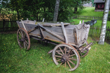 Fototapeta na wymiar Old traditional wooden horse drawn carriage in Masuria region of Poland