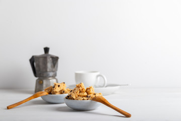 a serving of homemade cookie dough on a white background.
