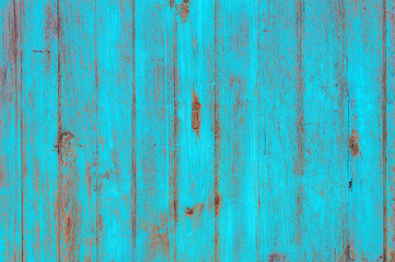 Vintage beach wood background - Old weathered wooden plank painted in turquoise blue pastel color.