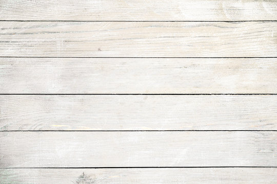Vintage white wood background - Old weathered wooden plank painted in white color.