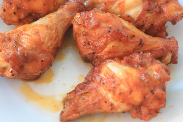 Close up chicken wings spicy in dish.