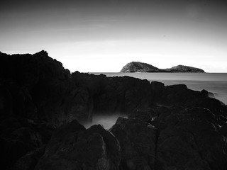 Double Island over rocks Palm Cove Queensland Australia 