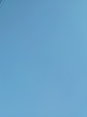 Clear blue sky background and empty space for your design, no cloud. 