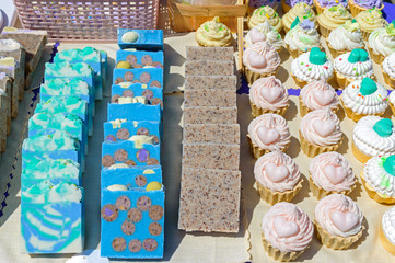 Beautiful colorful handmade soap. Soap manufacture Eco goods. Fair - an exhibition of folk craftsmen.