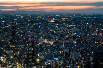 Fototapeta na wymiar 東京の都市風景　池袋から見る夕方の空３