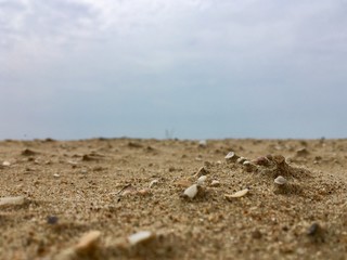 Fototapeta na wymiar Beach sand and sky in thailand