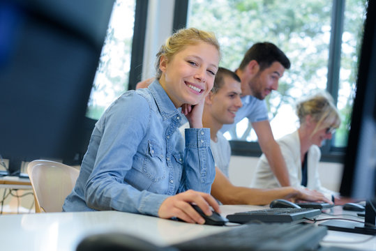 Portrait Of Young Woman In Computer Studies Class