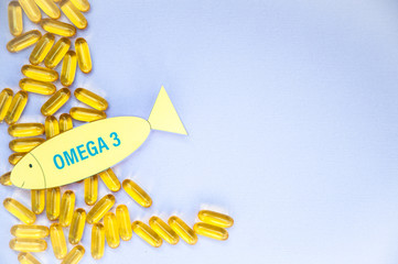 Fish oil omega 3 soft gel capsule pills, healthy product   and   supplement  concept close up,...