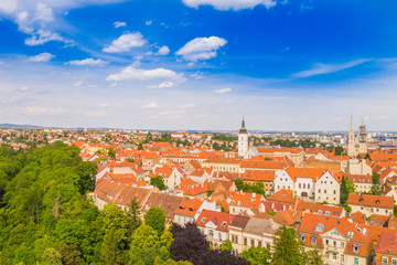 Obraz premium Panoramic view on Upper town and st Mark church in Zagreb, red roofs and palaces of old baroque center, political center of Croatia
