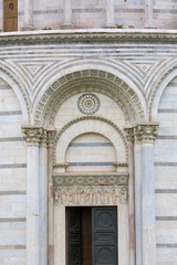 Fototapeta premium Pisa Baptistery of St. John, decorative details of facade, Pisa, Italy