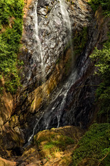 Fototapeta na wymiar beutiful waterfall with landscape background