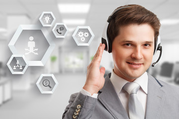 The concept of business, technology, the Internet and the network. A young entrepreneur working on a virtual screen of the future