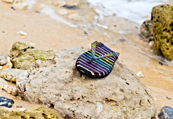 flip flops lost sandy beachafter tsunami disaster