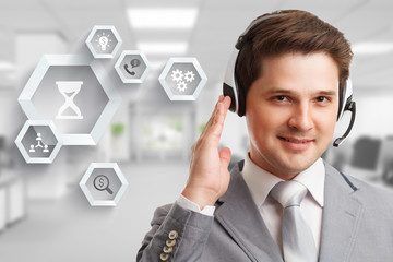 The concept of business, technology, the Internet and the network. A young entrepreneur working on a virtual screen of the future