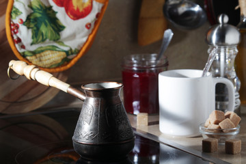 Morning still life with a coffee pot and a mug