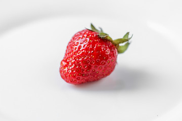 strawberries on a white plate