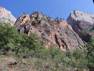 Massive mposing rocks and steep sandstone cliffs at Zion National Park, Utah.
